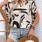 Perfee Printed Notched Half Sleeve Blouse