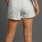 Umgee Floral Elastic Waist Jacquard Shorts with Pockets