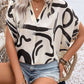 Perfee Printed Notched Half Sleeve Blouse