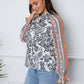 Tassel Tie Neck Printed Smocked Long Sleeve Blouse